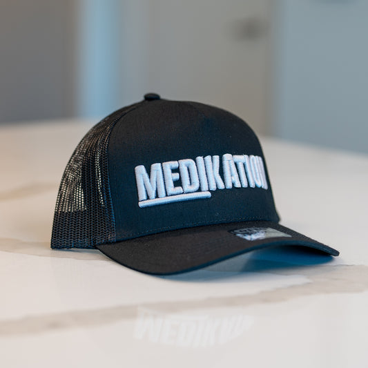 MEDIKATION Grey-Stitch Trucker Hat — front view